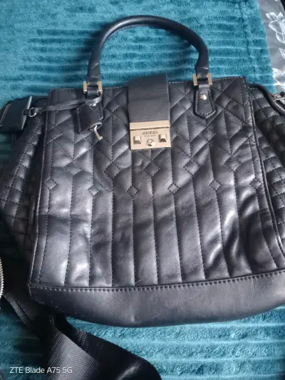Mochila beige con bolsillo frontal - miniatura 2