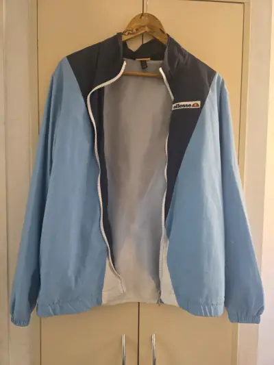 Chaqueta cortaviento Ellesse azul y celeste - miniatura 1