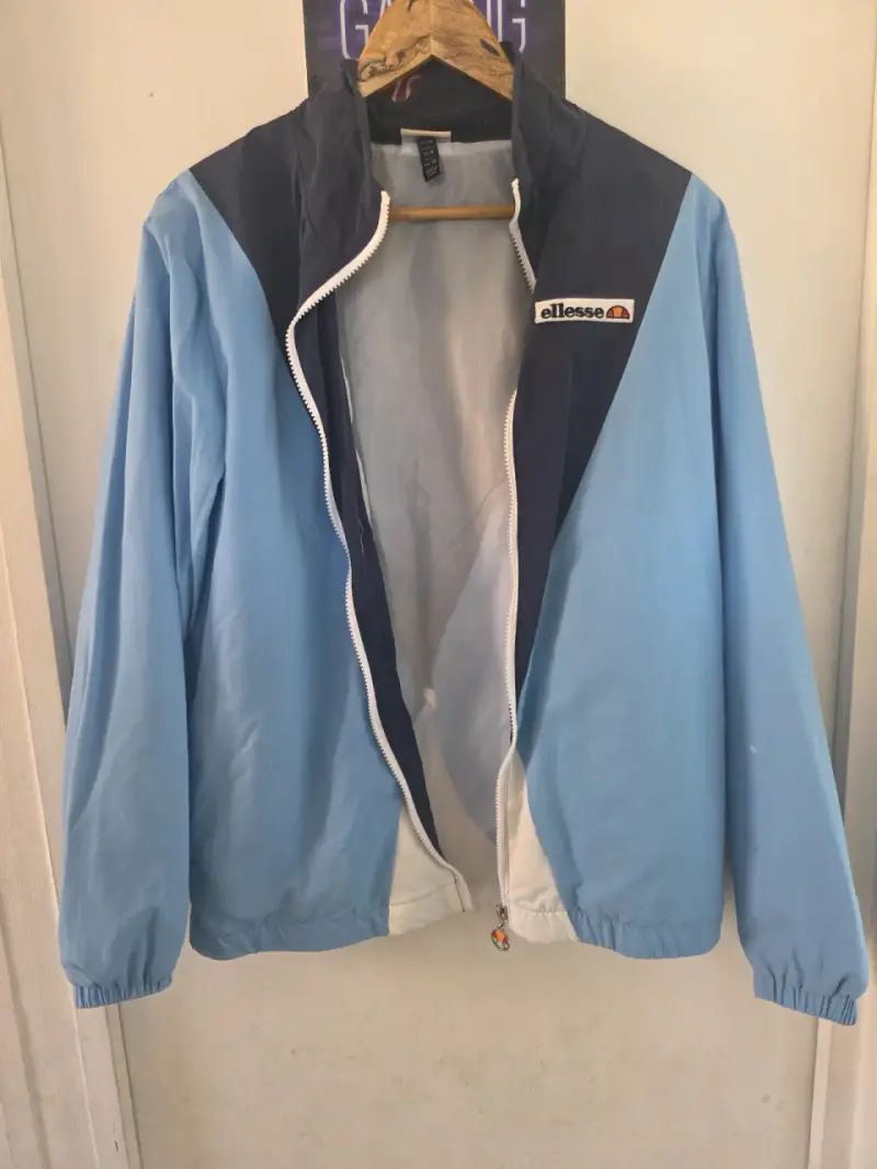 Chaqueta cortaviento Ellesse azul y celeste - 4