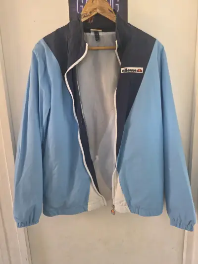 Chaqueta cortaviento Ellesse azul y celeste - miniatura 4