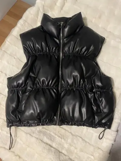 Chaqueta acolchado negro sin mangas - miniatura 1