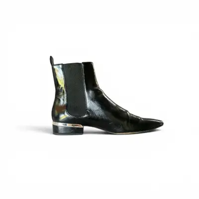 Botines de cuero negro con detalle metálico - miniatura 1