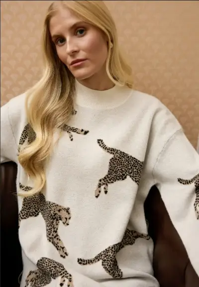 Suéter beige con estampado de leopardos - miniatura 2