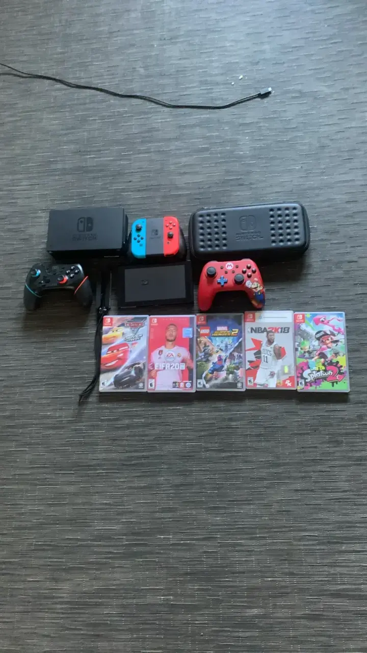Consola Nintendo Switch con juegos y accesorios - 1