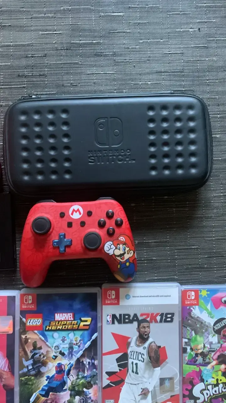Consola Nintendo Switch con juegos y accesorios - 4