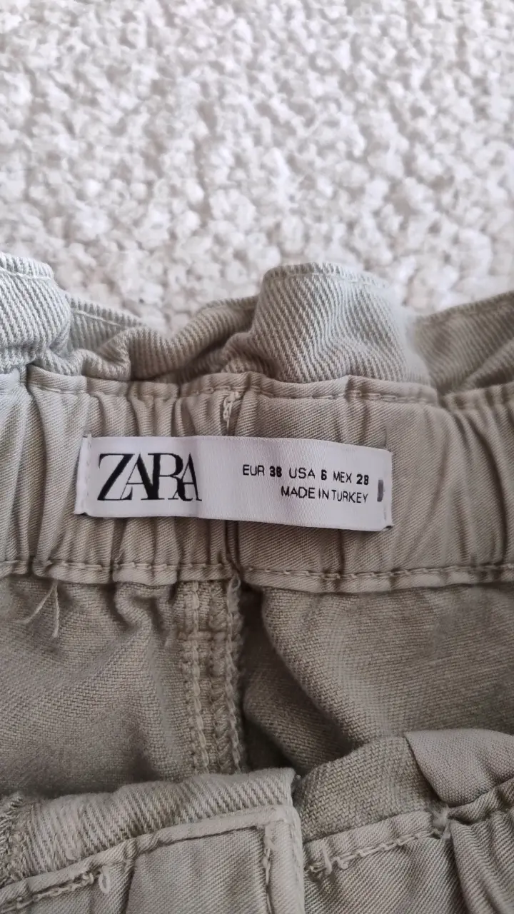 Pantalones beige de tiro alto para mujer - 3