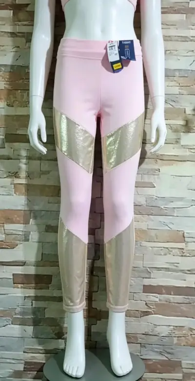 Leggings deportivos rosados con detalles dorados - miniatura 1