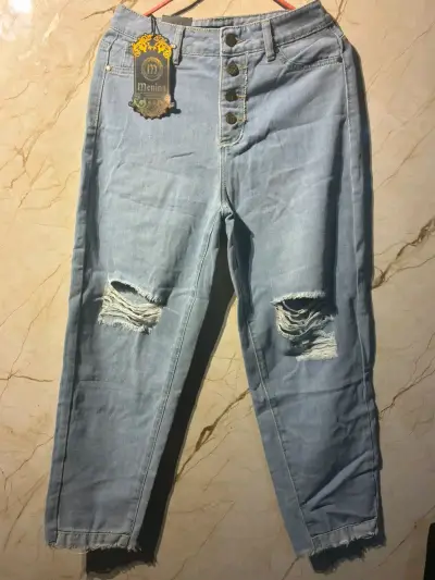 Jeans celestes desgastados para mujer - miniatura 3