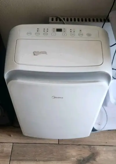 Aire acondicionado portátil Midea usado - miniatura 1