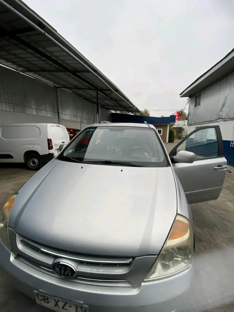 Kia  gran Carnival 2010 - 3
