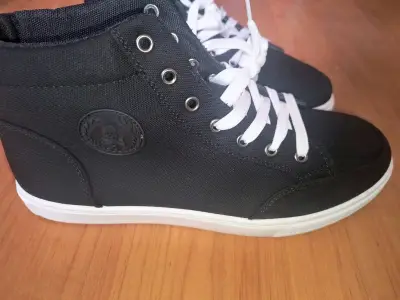 Zapatillas negras de lona con diseño casual - miniatura 1