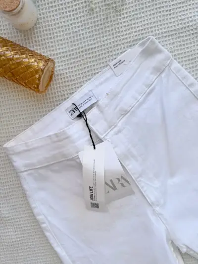 Pantalones blancos Zara nuevos talla 36 - miniatura 2
