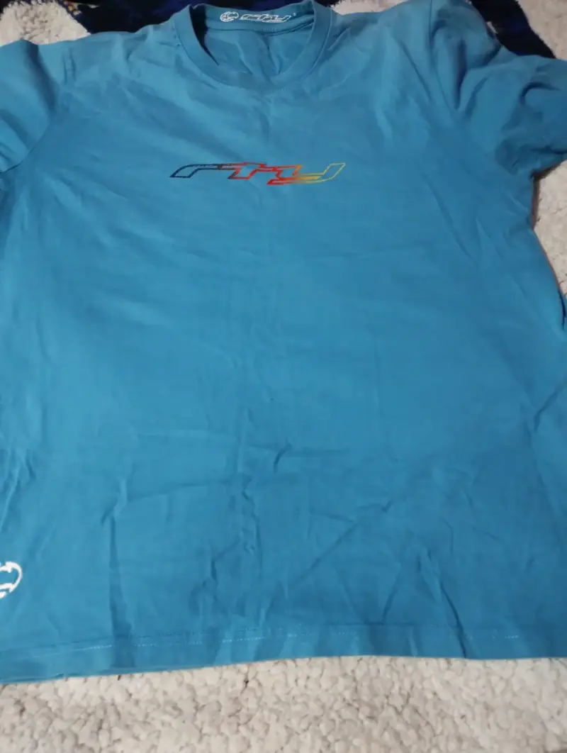 Polera celeste con logo Fly Racing - 1
