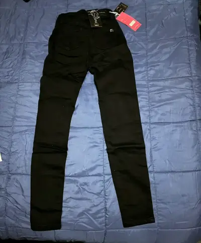 Jeans negros para mujer con etiqueta - miniatura 1