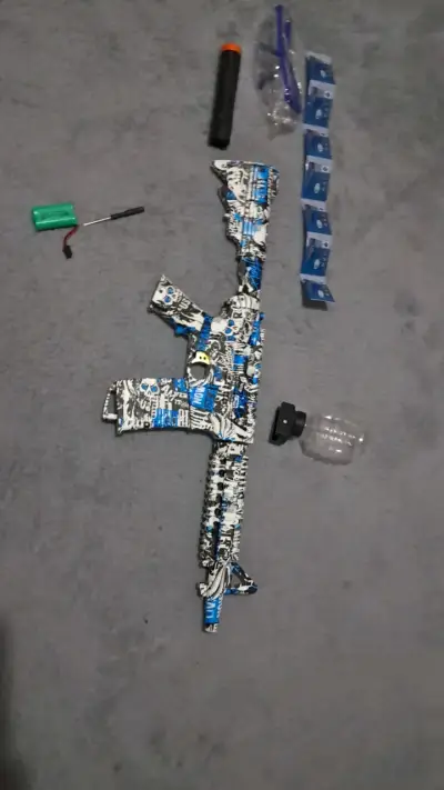 Rifle de juguete con accesorios - miniatura 1