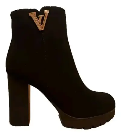 Botines negros de tacón alto con detalle dorado - miniatura 1