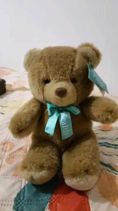 Osito de peluche marrón con lazo - miniatura 1