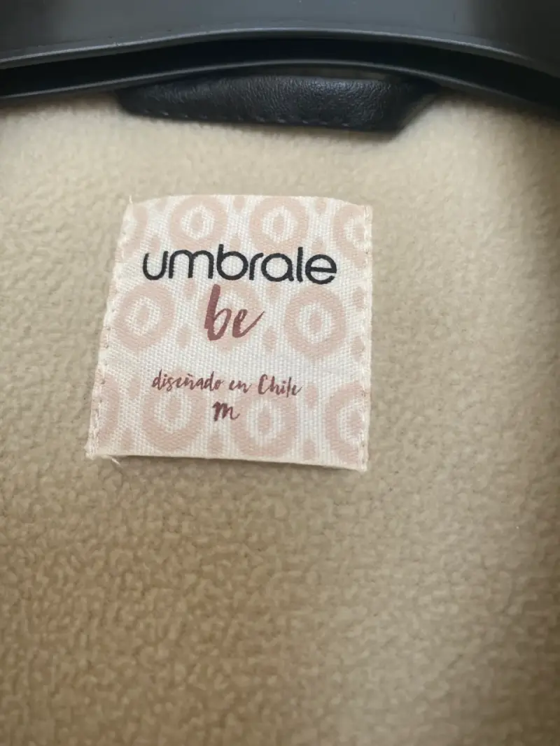 Chaqueta de lana beige con detalles negros - 2
