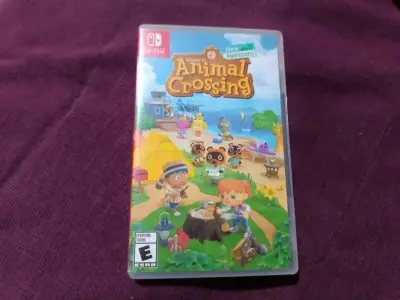 Nintendo Switch Lite coral con juego Animal Crossing - miniatura 3