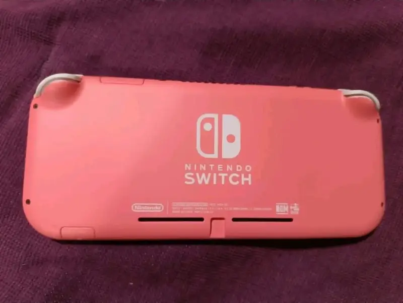 Nintendo Switch Lite coral con juego Animal Crossing - 4