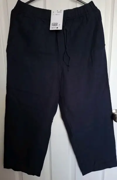 Pantalones deportivos negros - miniatura 3