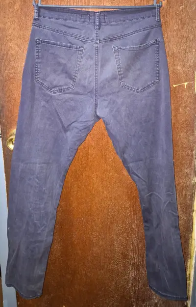 Jeans azul oscuro para hombre en buen estado - miniatura 1