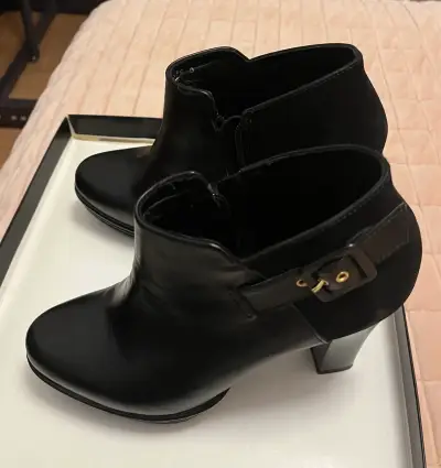 Botines de cuero negro con tacón - miniatura 1