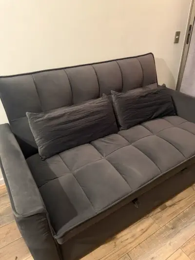 Sofá cama gris moderno y cómodo - miniatura 1