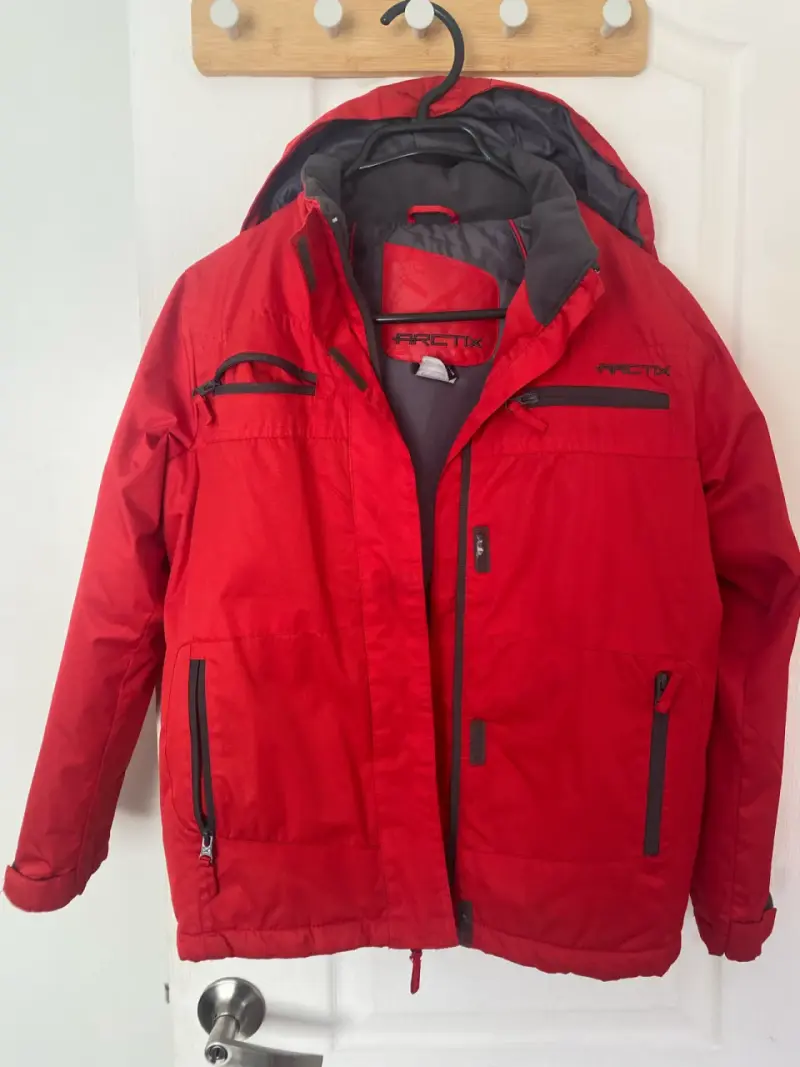 Chaqueta impermeable roja Arctix  talla 10/12