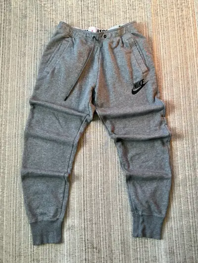 Pantalones deportivos Nike grises para hombre - miniatura 1