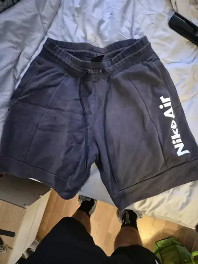 Shorts deportivos Nike Air negro. - miniatura 1