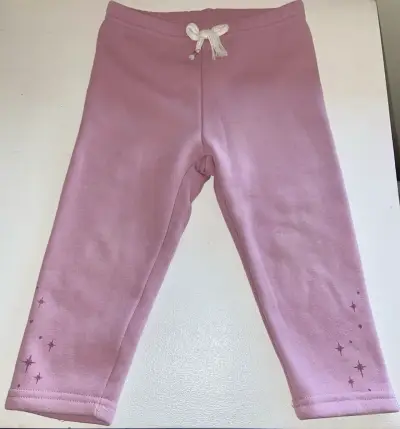 Leggings rosados para niña con diseño de estrellas - miniatura 1