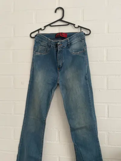Jeans de mezclilla azul para mujer - miniatura 2