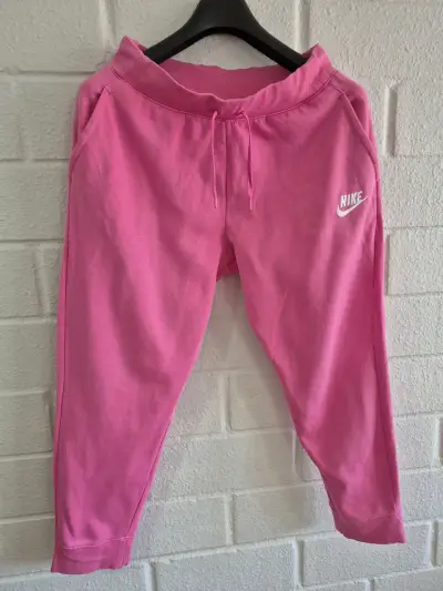 Pantalones deportivos Nike rosados para mujer - miniatura 1