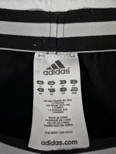 Pantalones deportivos Adidas negros con franjas - miniatura 2