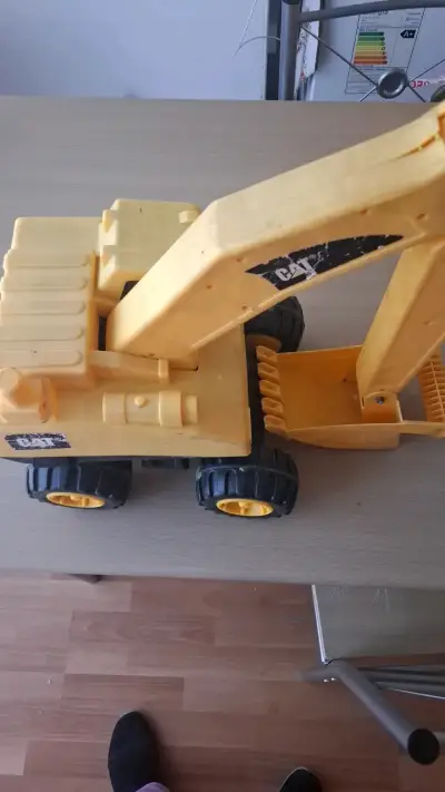Excavadora de juguete CAT amarilla - miniatura 1