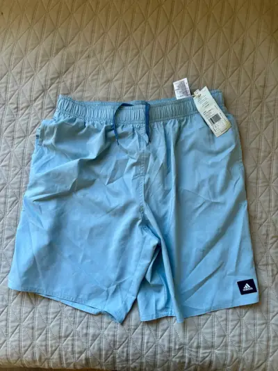 Shorts deportivos Adidas celestes nuevos - miniatura 1