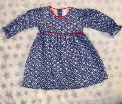 Vestido infantil azul con flores - miniatura 1