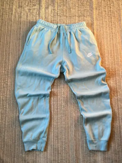 Pantalones deportivos Nike celestes - miniatura 1