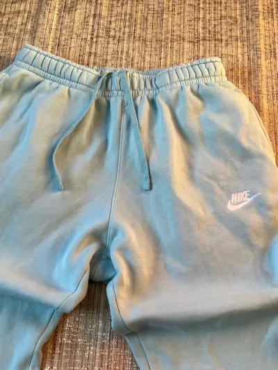 Pantalones deportivos Nike celestes - miniatura 2