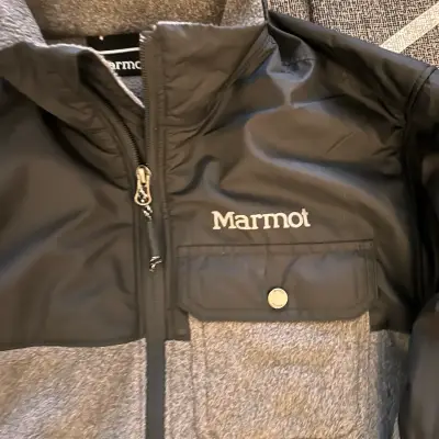 Chaqueta Marmot negra y gris para hombre - miniatura 1
