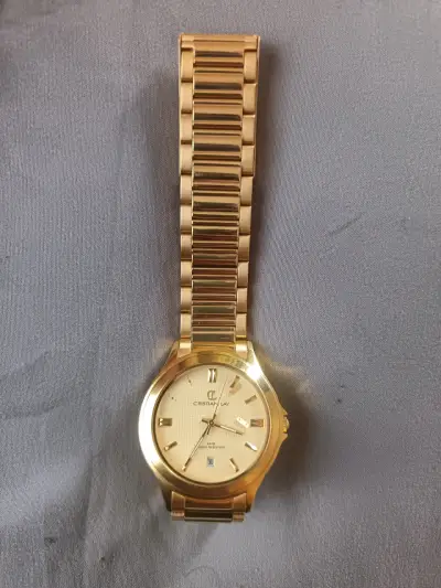 Reloj dorado Cristian Lay elegante - miniatura 1