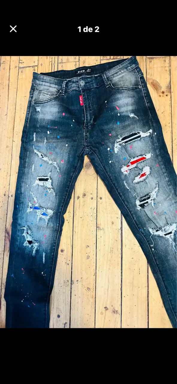 Jeans desgastados con detalles de pintura - 2