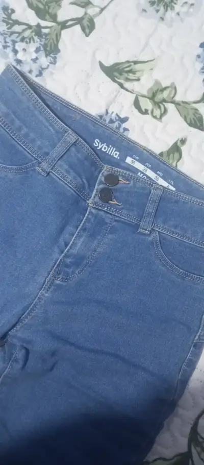 Jeans ajustados azul claro para mujer - miniatura 2