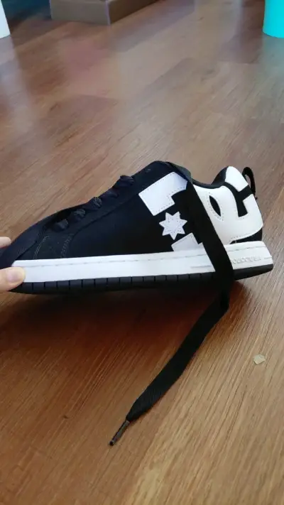 Zapatillas DC negras de mujer - miniatura 1
