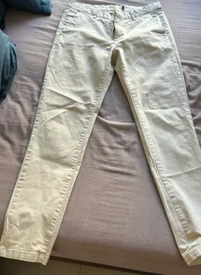 Pantalones beige de algodón para hombre - miniatura 1