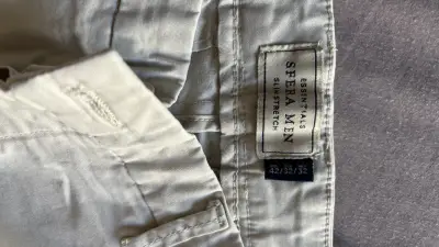 Pantalones beige de algodón para hombre - miniatura 2
