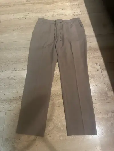 Pantalones casuales color beige con cordón - miniatura 1