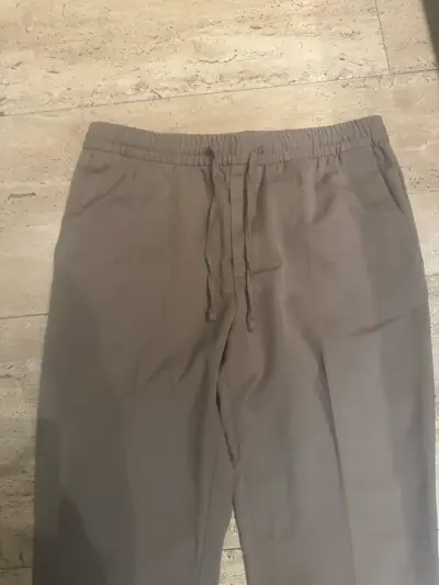 Pantalones casuales color beige con cordón - miniatura 2