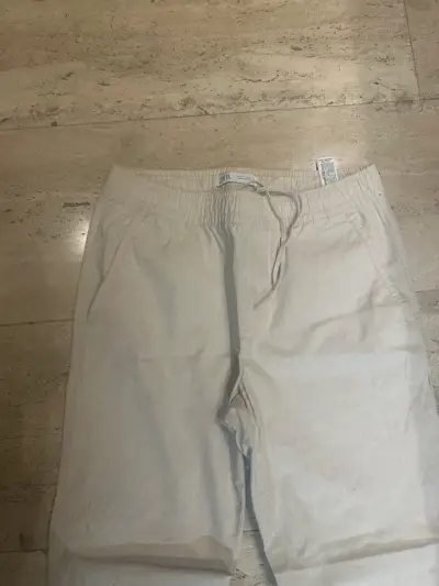 Pantalones beige casuales para hombre - miniatura 2